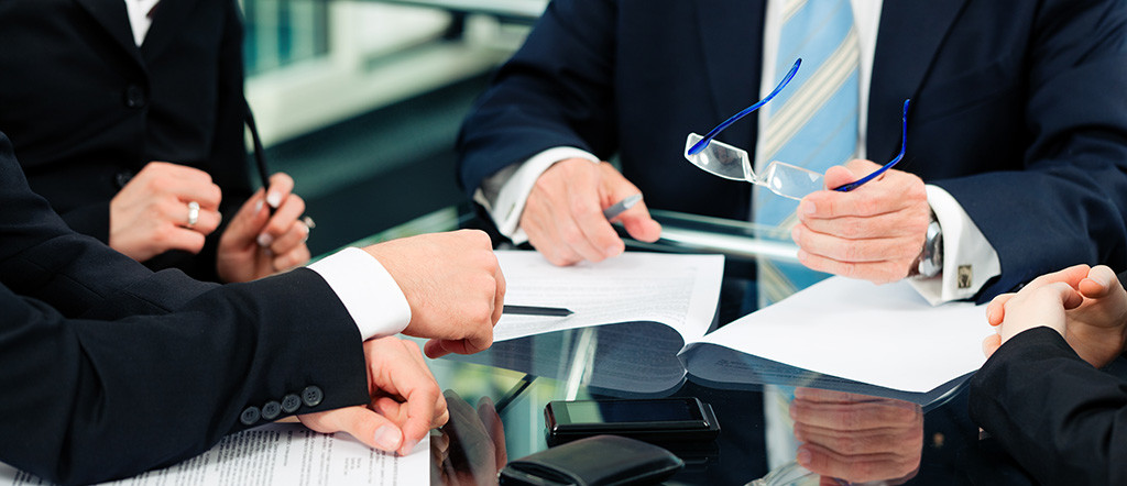 Business meeting with work on contract